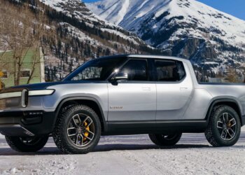 Rivian Lowers Delivery Forecast, Raises Spending Amid Tariff Costs