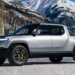Rivian Lowers Delivery Forecast, Raises Spending Amid Tariff Costs