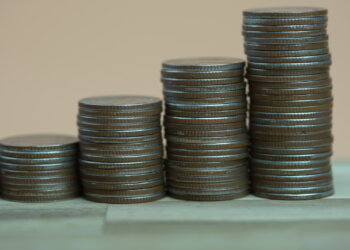 Tariffs Ignite Inflation Fears Despite Business Pickup